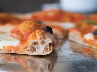 A More Whole Wheat Sourdough Pizza Dough via @theperfectloaf