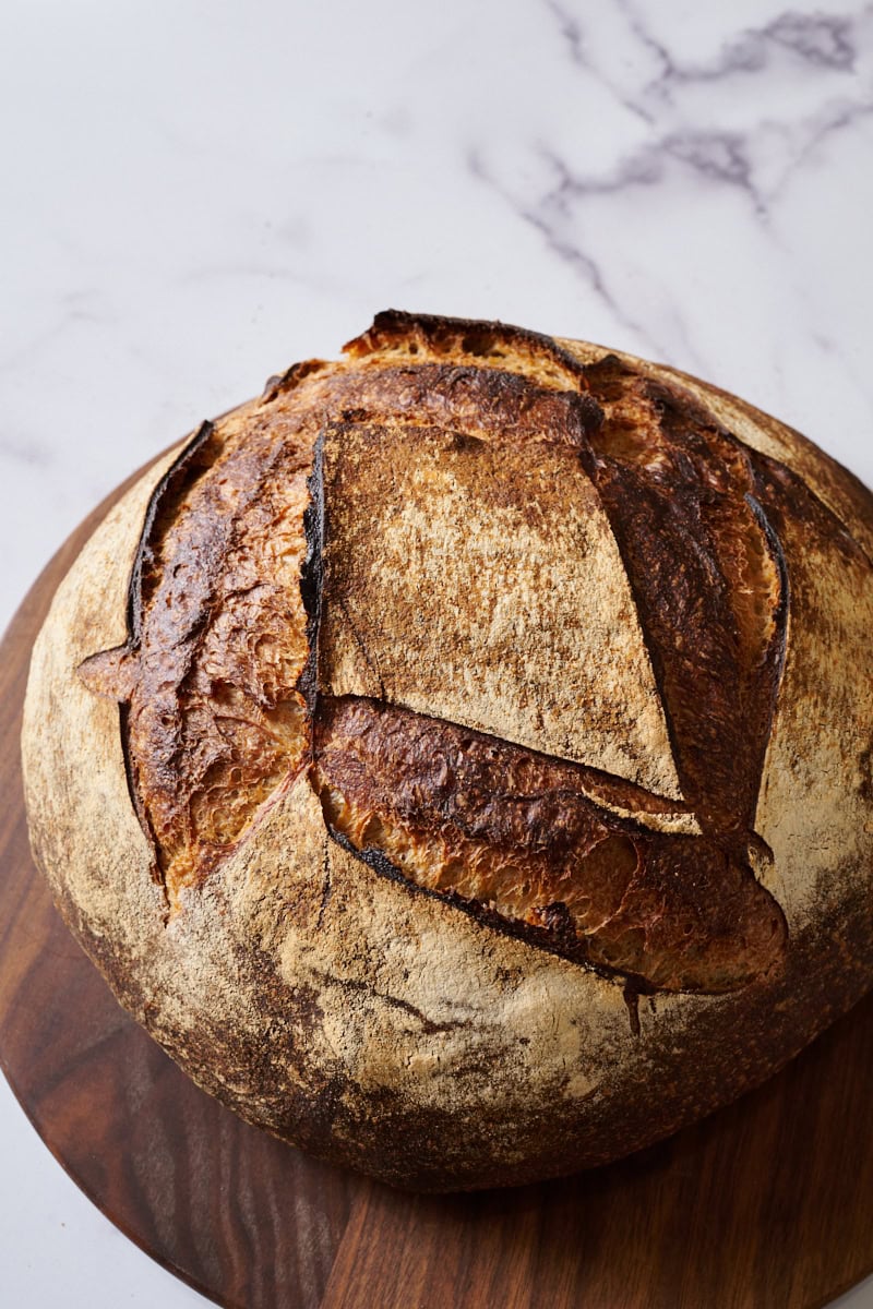 The large size and stunning crust of this miche.