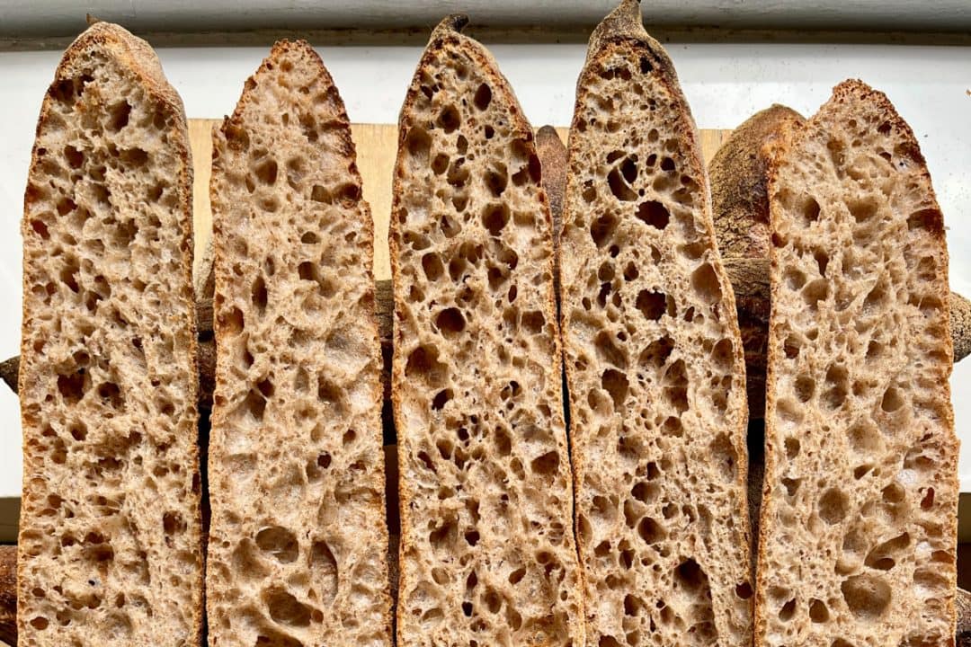 Sliced baguettes with whole grain flour.