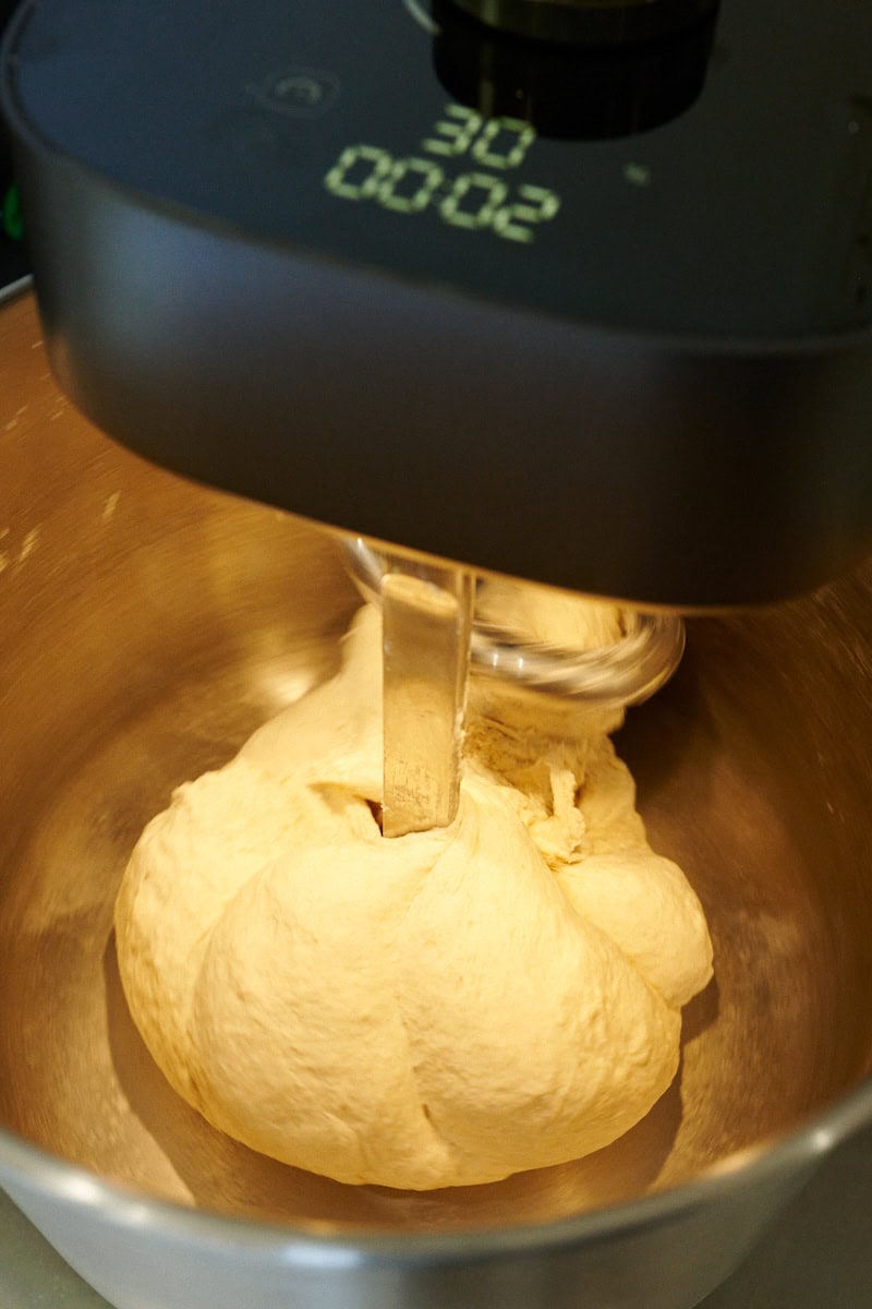 Mixing sourdough pizza dough with the Ooni Halo Pro.