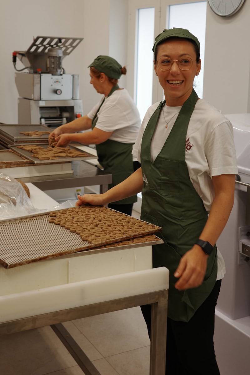 A lady making taralli crackers.