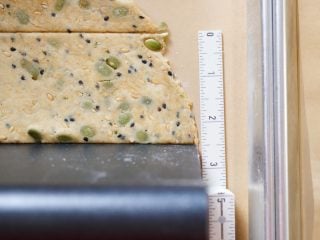 Cutting the cracker dough.