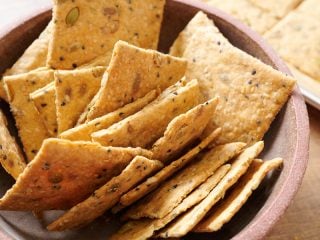 Baked seeded sourdough discard crackers.
