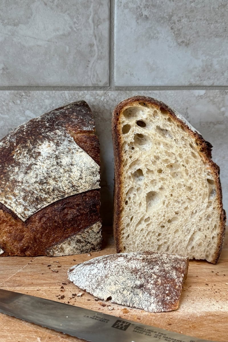 Sourdough miche with a thicker crust due to the longer bake time.