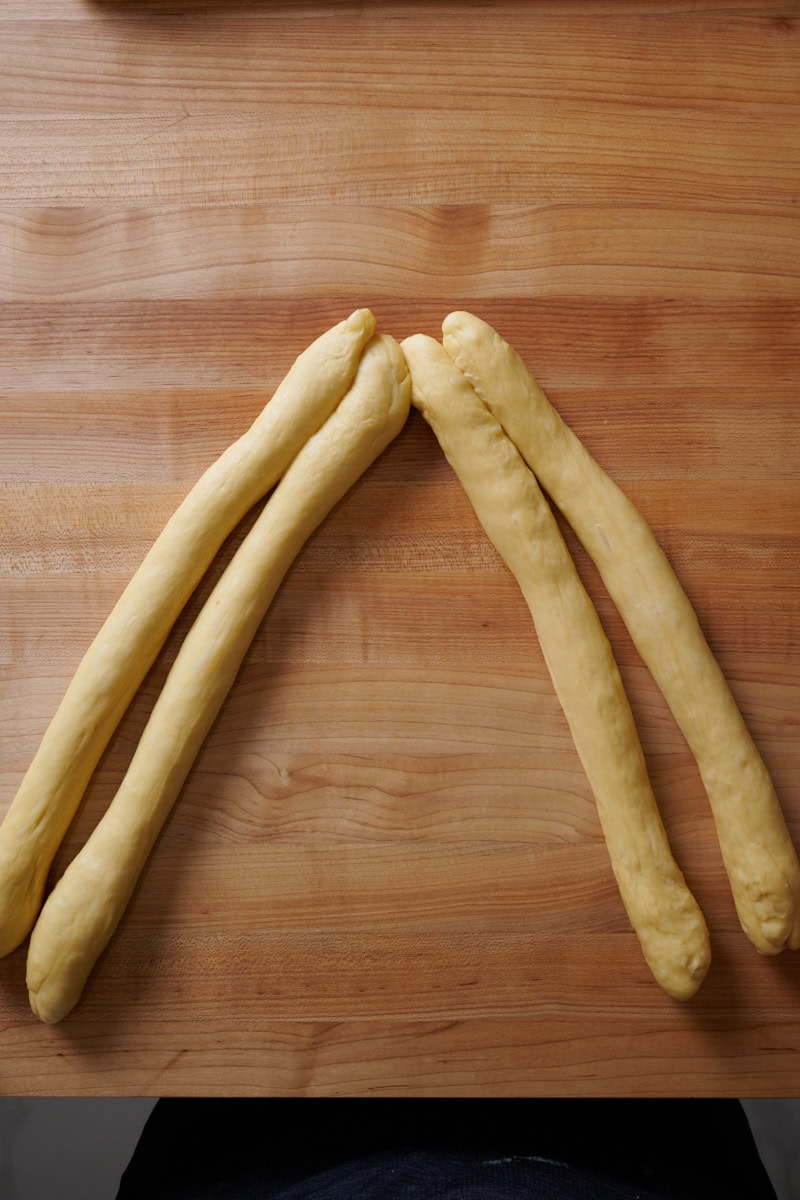 Braiding a 4 strand challah.