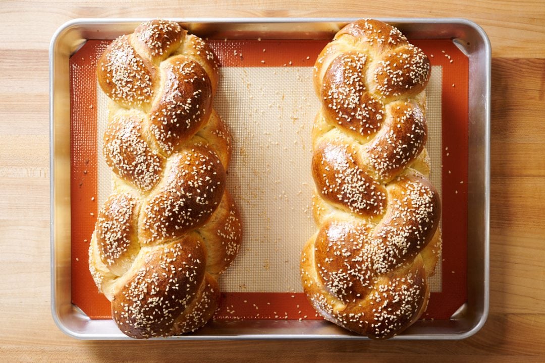 The Perfect Loaf's sourdough challah topped with sesame seeds.