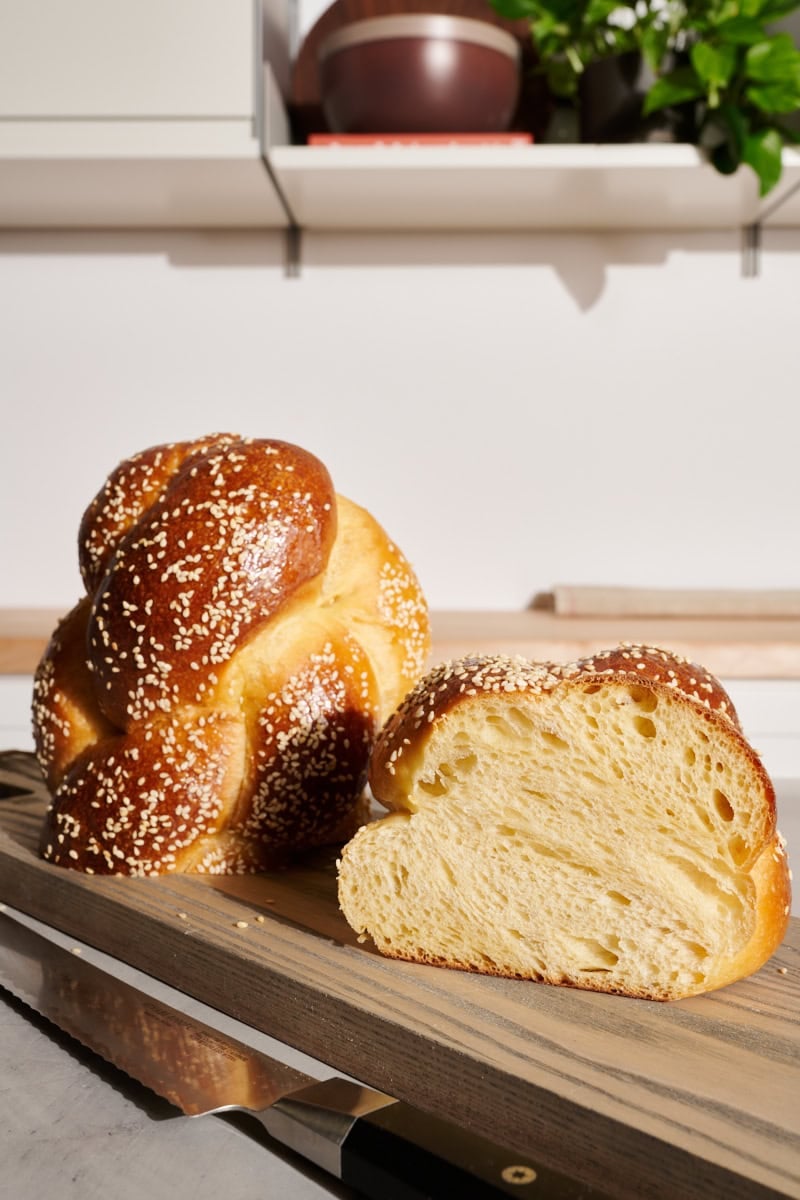 Properly fermented challah with open and light texture.