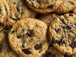 Sourdough starter discard chocolate chip cookies in a pile