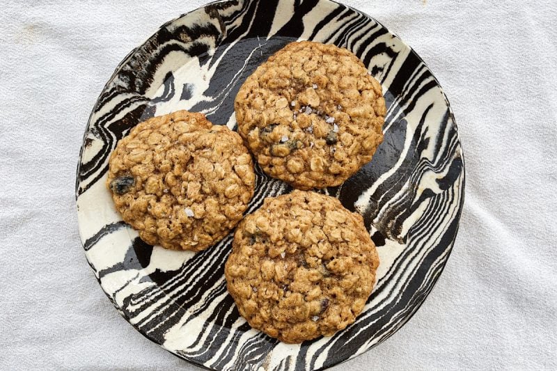 Sourdough discard oatmeal raisin cookies on a plate.